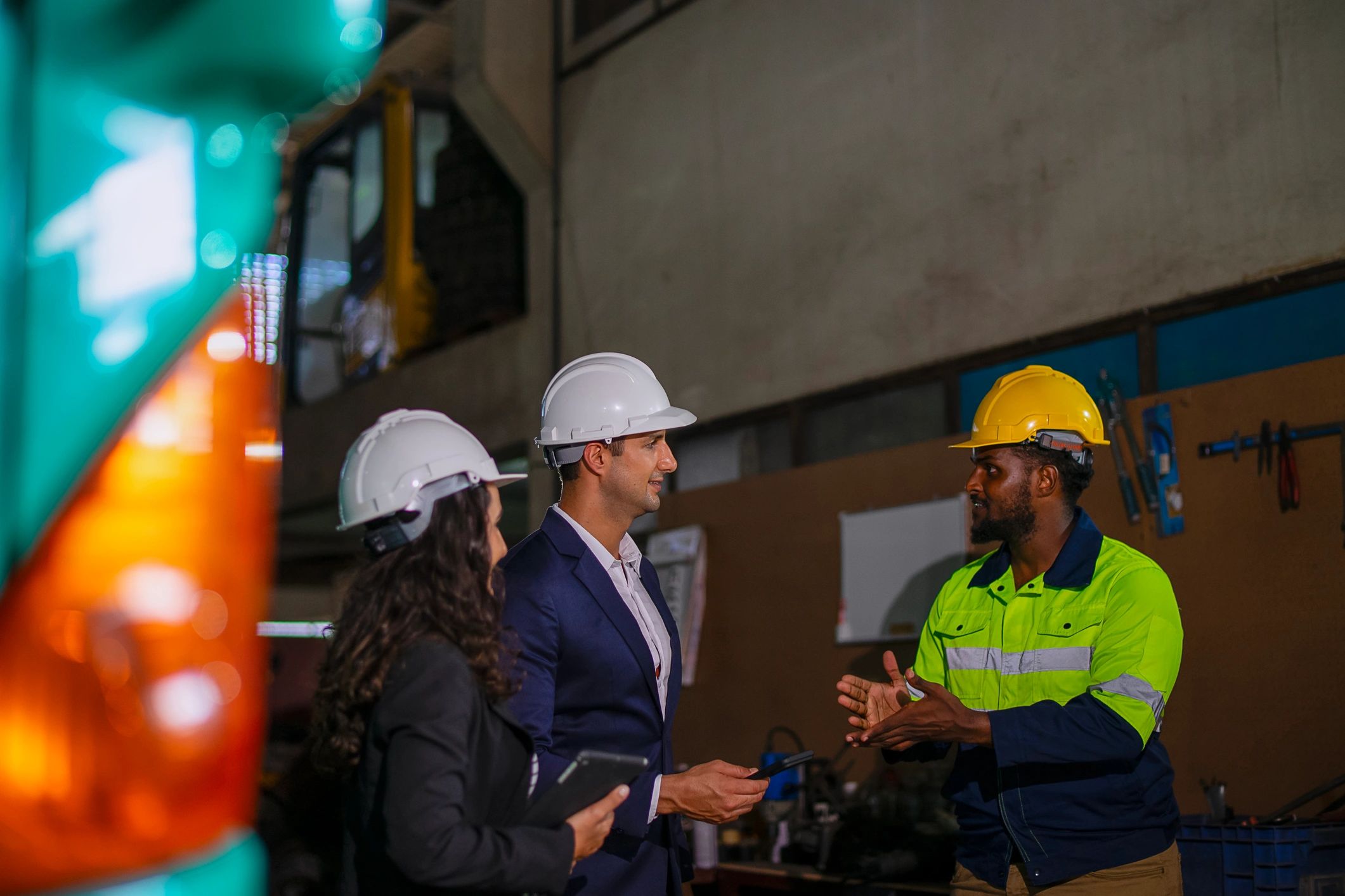 Professional team member in engineering discussion